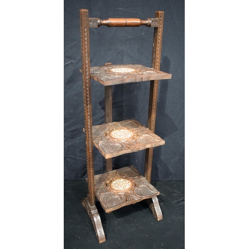 3160 - A Three tier Anglo Indian carved wood and inlaid central stands 77 x 28 cm.