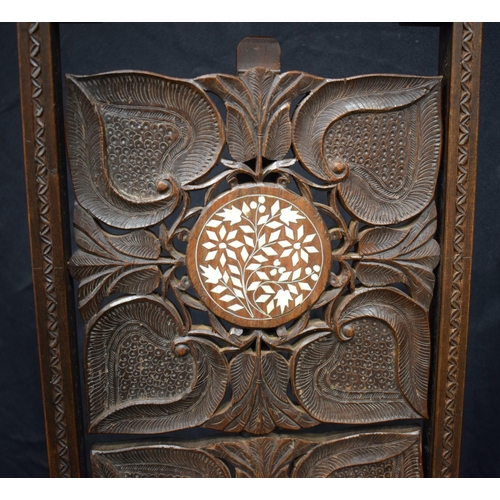 3160 - A Three tier Anglo Indian carved wood and inlaid central stands 77 x 28 cm.