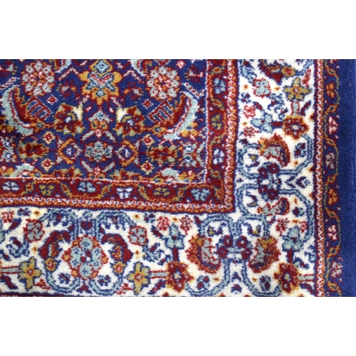 3168 - A blue ground Oriental rug 175 x 90cm.