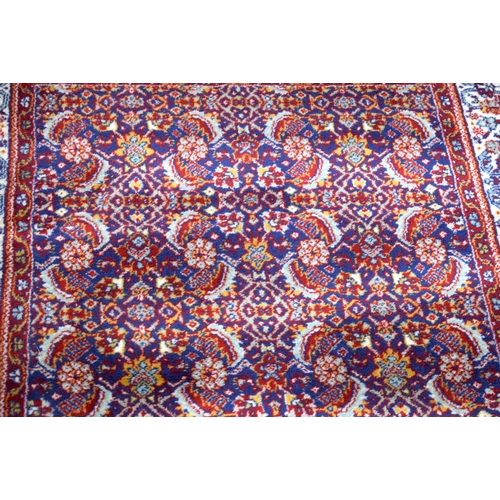 3168 - A blue ground Oriental rug 175 x 90cm.