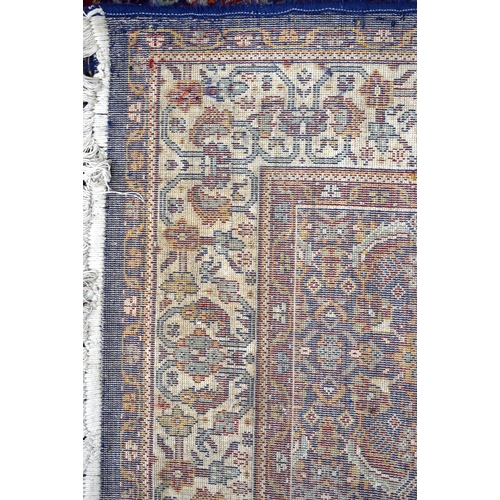 3168 - A blue ground Oriental rug 175 x 90cm.