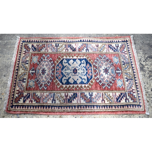 3171 - A Afghan prayer rug together with two other prayer rugs, largest 80 x 54cm.(3)