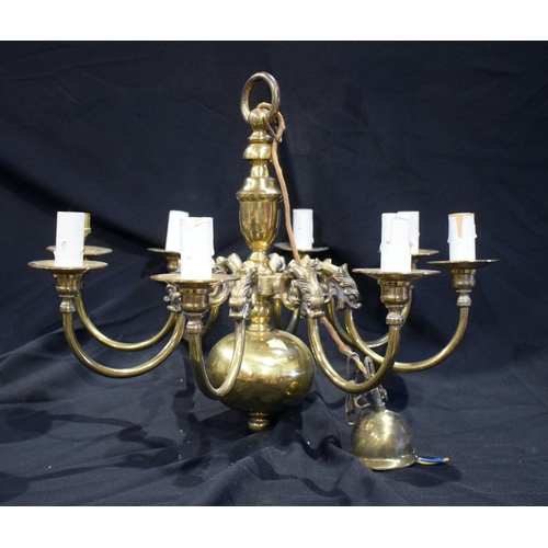 3187 - A brass eight arm chandelier 52 x 64cm.