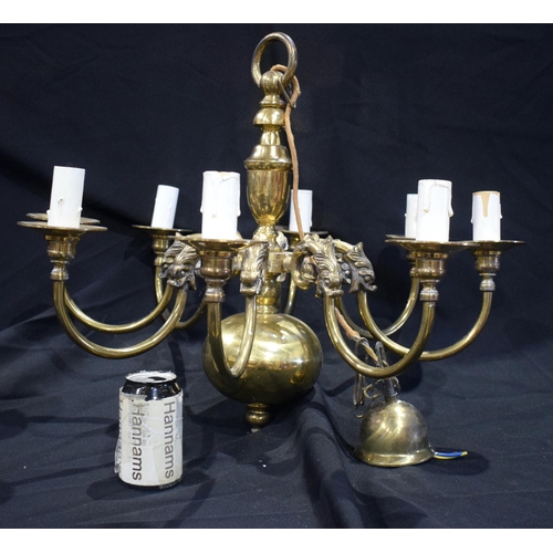 3187 - A brass eight arm chandelier 52 x 64cm.