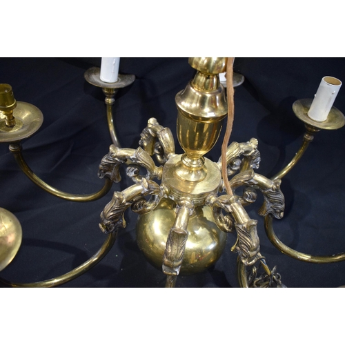 3187 - A brass eight arm chandelier 52 x 64cm.