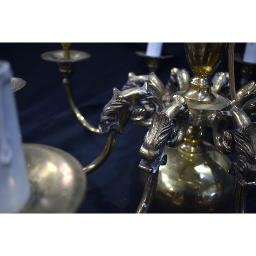 3187 - A brass eight arm chandelier 52 x 64cm.