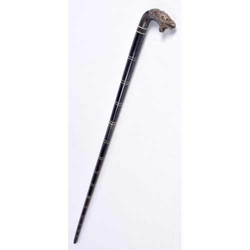 3338 - A carved Ebony and  horn handled  walking cane 85 cm