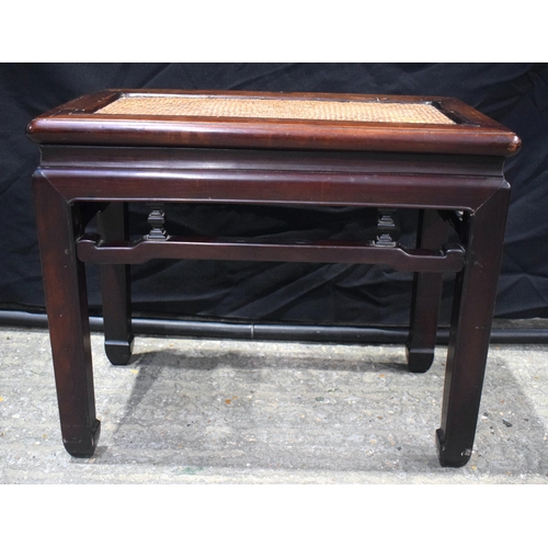 3554 - AN 18TH/19TH CENTURY CHINESE CARVED HUANGHUALI WOOD STOOL Qing, with rattan top. 60 cm x 50 cm.