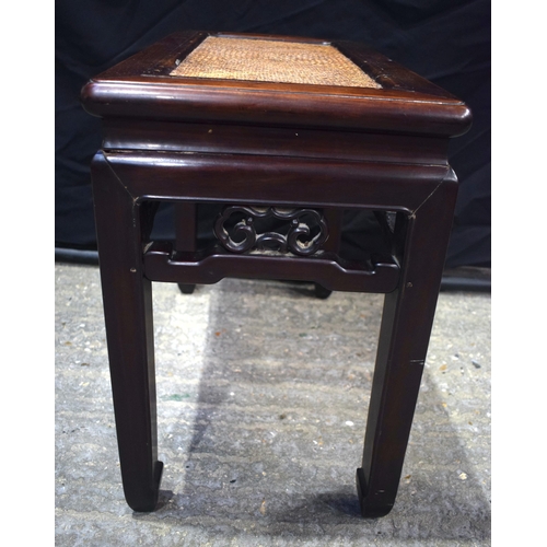 3554 - AN 18TH/19TH CENTURY CHINESE CARVED HUANGHUALI WOOD STOOL Qing, with rattan top. 60 cm x 50 cm.