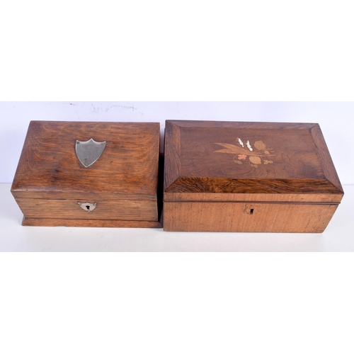3630 - A pair of South American wooden carvings together with an antique oak lidded box and a Mahogany inla... 
