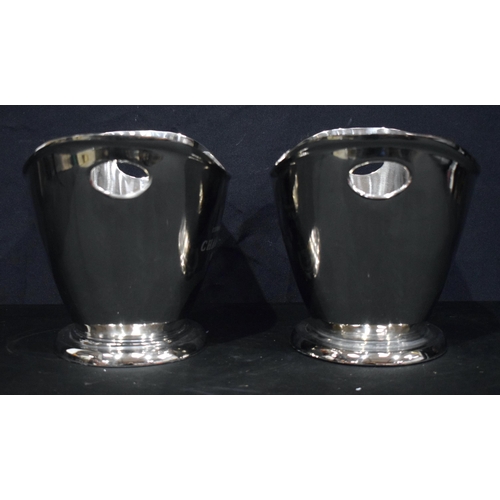 3747 - A pair of stainless steel  Champagne coolers 27 x 36 cm.(2).