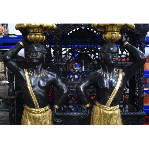 3753 - A FINE LARGE PAIR OF 19TH CENTURY ITALIAN CARVED AND GILDED WOOD BLACKAMOORS modelled holding aloft ... 