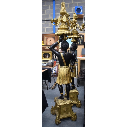 3753 - A FINE LARGE PAIR OF 19TH CENTURY ITALIAN CARVED AND GILDED WOOD BLACKAMOORS modelled holding aloft ... 