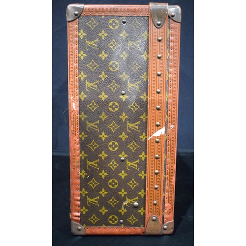 3755 - A Louis Vuitton suitcase, the central lock bears the number 130807, cm 22 x  70 x 47 cm