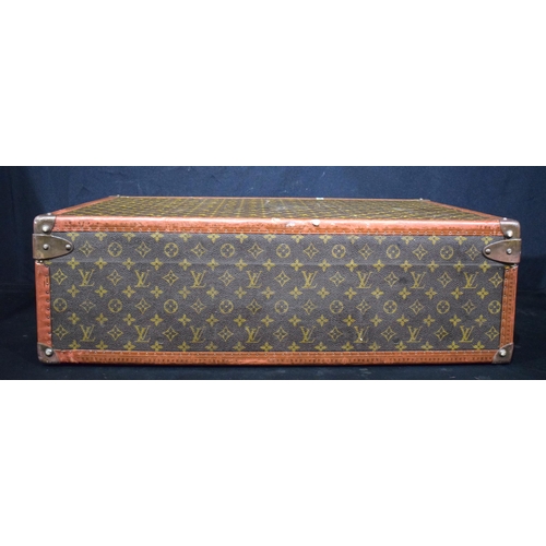 3755 - A Louis Vuitton suitcase, the central lock bears the number 130807, cm 22 x  70 x 47 cm