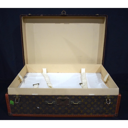 3755 - A Louis Vuitton suitcase, the central lock bears the number 130807, cm 22 x  70 x 47 cm