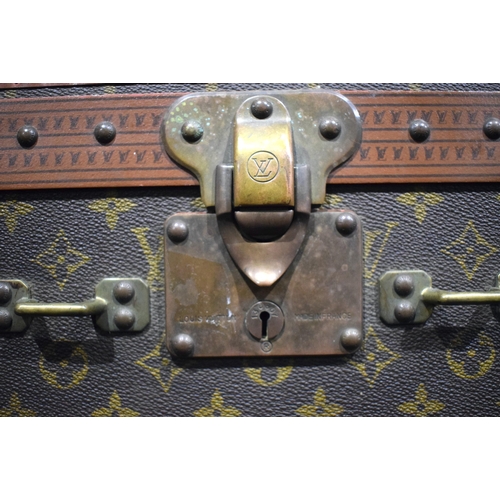 3755 - A Louis Vuitton suitcase, the central lock bears the number 130807, cm 22 x  70 x 47 cm