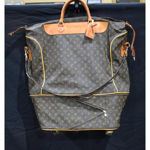 3756 - A Louis Vuitton Travel Satchel with castors to base 65 x 46 x 27 cm.