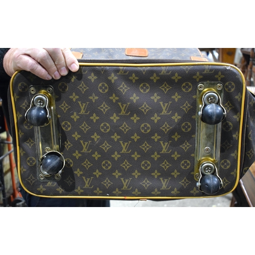 3756 - A Louis Vuitton Travel Satchel with castors to base 65 x 46 x 27 cm.