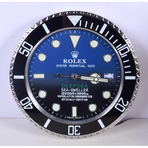 3769 - A Contemporary Rolex wall clock 34 cm.