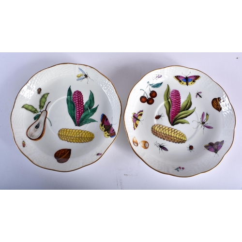 105 - AN EARLY HUNGARIAN HEREND PORCELAIN PART DESSERT SET painted with fruit and foliage. Largest 19 cm w... 