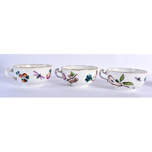 105 - AN EARLY HUNGARIAN HEREND PORCELAIN PART DESSERT SET painted with fruit and foliage. Largest 19 cm w... 