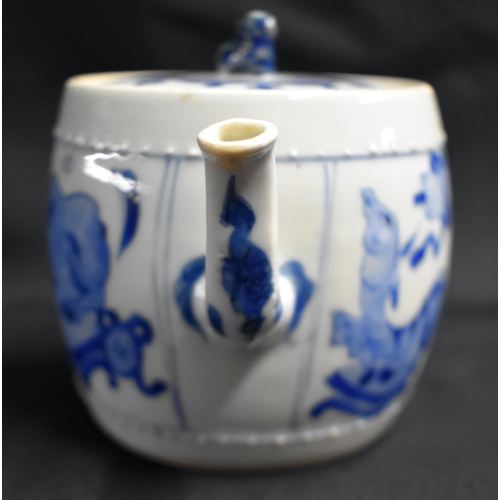 19 - A GOOD 17TH CENTURY CHINESE BLUE AND WHITE PORCELAIN TEAPOT AND COVER Kangxi, of barrel form, painte... 