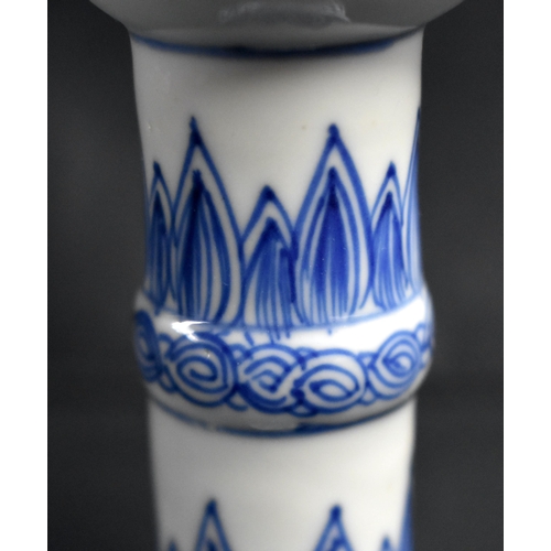 2 - A RARE 17TH CENTURY CHINESE BLUE AND WHITE RIBBED PORCELAIN BEAKER Kangxi, painted with flowers and ... 