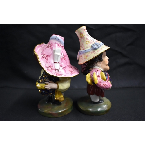 22 - A PAIR OF ROYAL CROWN DERBY MANSIONS DWARFS. 17 cm high.