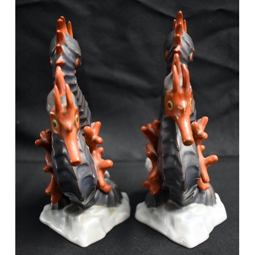 23 - A PAIR OF HEREND HUNGARIAN PORCELAIN SEA HORSES. 18 cm x 9 cm.