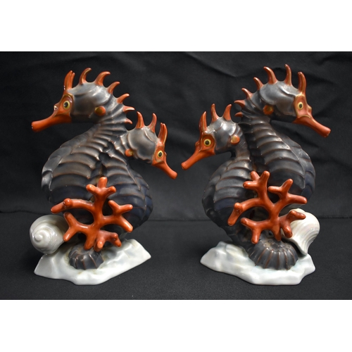 23 - A PAIR OF HEREND HUNGARIAN PORCELAIN SEA HORSES. 18 cm x 9 cm.