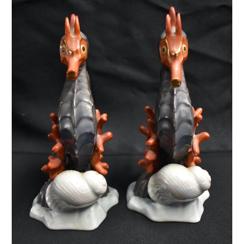 23 - A PAIR OF HEREND HUNGARIAN PORCELAIN SEA HORSES. 18 cm x 9 cm.