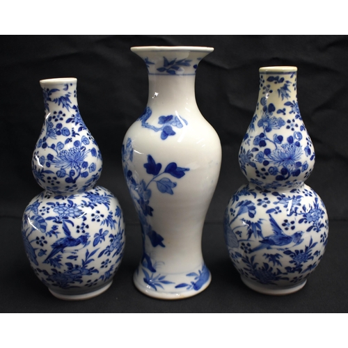 24 - A PAIR OF 19TH CENTURY CHINESE BLUE AND WHITE PORCELAIN DOUBLE GOURD VASES Qing, together with a Lat... 