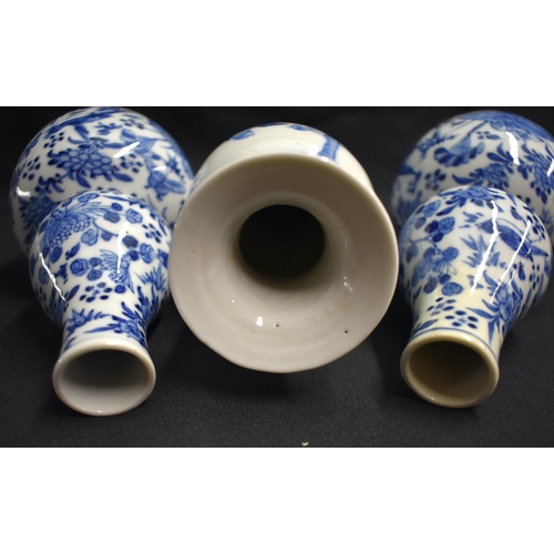 24 - A PAIR OF 19TH CENTURY CHINESE BLUE AND WHITE PORCELAIN DOUBLE GOURD VASES Qing, together with a Lat... 