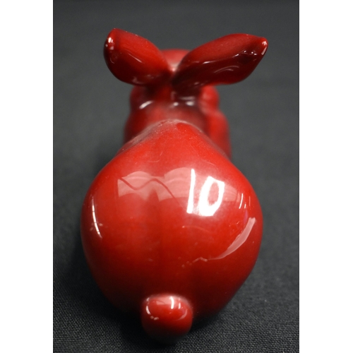 26 - A ROYAL DOULTON FLAMBE GEISHA together with a similar rabbit. Largest 23.5 cm high. (2)