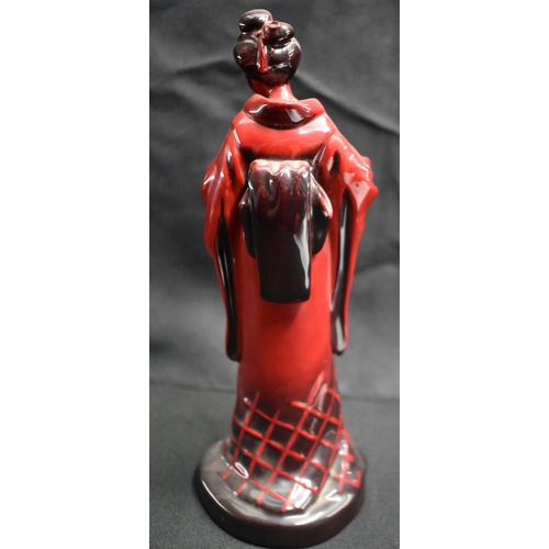 26 - A ROYAL DOULTON FLAMBE GEISHA together with a similar rabbit. Largest 23.5 cm high. (2)