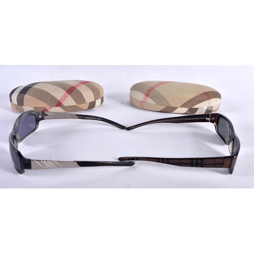 284 - Two Cased Pair of Burberry Ladies Sunglasses.  Largest 13.3cm wide (2)