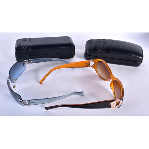 287 - Two Cased Pair of Versace Ladies Sunglasses.  Largest 13.5cm wide (2)