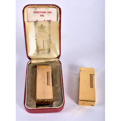 289 - Two Vintage Dunhill gold plated Lighters (1 in case with service papers) marked to the base US RE241... 