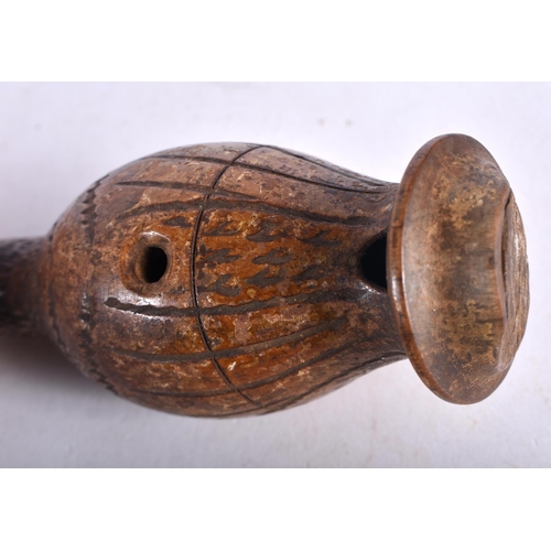 294 - An Antique Wood Cuckoo Whistle stylistically carved to resemble a cuckoo with a head, feathers, beak... 