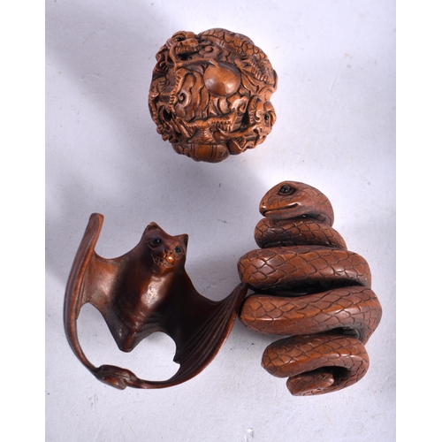 295 - Three Japanese Hand Carved Netsuke (Snake, Bat and Dragon Chasing Flaming Pearl). Largest 4.5cm x 3.... 