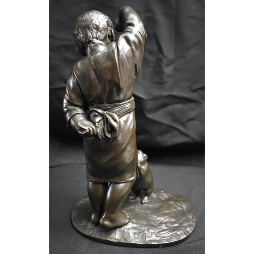 36 - A LARGE 19TH CENTURY JAPANESE MEIJI PERIOD BRONZE OKIMONO by Masaaki, modelled as a boy teasing a ch... 