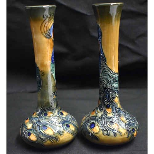 38 - A PAIR OF MOORCROFT PEACOCK FEATHER VASES by Rachel Bishop. 20.5 cm high.