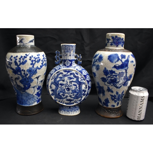 41 - A LARGE PAIR OF 19TH CENTURY CHINESE BLUE AND WHITE PORCELAIN VASES Qing, together with a 19th centu... 