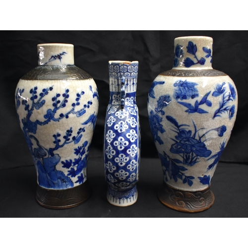 41 - A LARGE PAIR OF 19TH CENTURY CHINESE BLUE AND WHITE PORCELAIN VASES Qing, together with a 19th centu... 