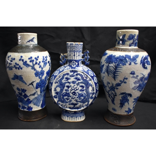 41 - A LARGE PAIR OF 19TH CENTURY CHINESE BLUE AND WHITE PORCELAIN VASES Qing, together with a 19th centu... 