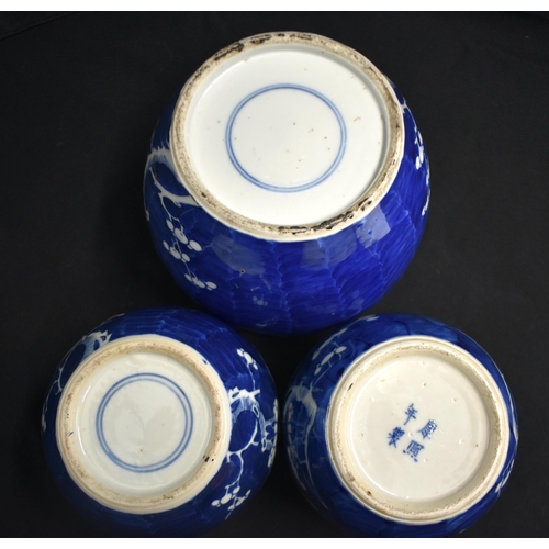 43 - THREE 19TH CENTURY CHINESE BLUE AND WHITE PORCELAIN GINGER JARS Kangxi style. Largest 18 cm x 12 cm.... 