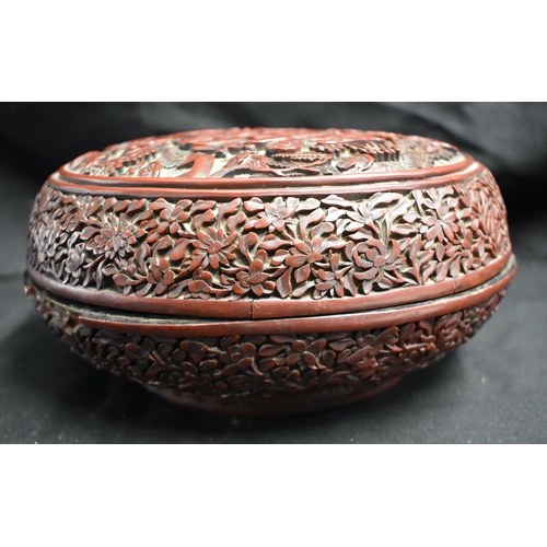 44 - A FINE LARGE 19TH CENTURY CHINESE CARVED CINNABAR LACQUER CIRCULAR BOX AND COVER decorated all over ... 