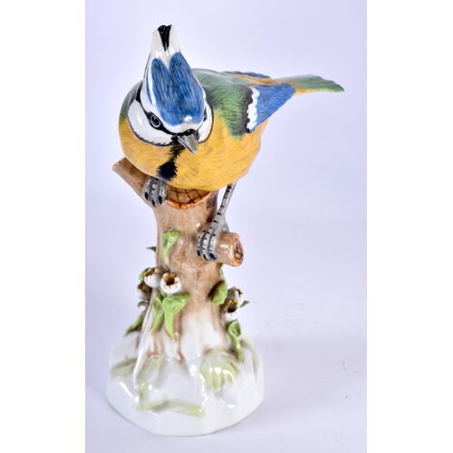 454 - A MEISSEN PORCELAIN RETICULATED BIRD DISH together with a Meissen bird. Largest 27 cm x 20 cm. (2)