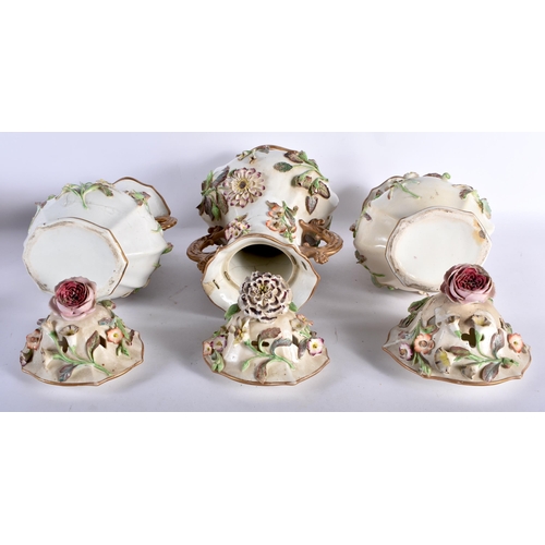 457 - A LARGE EARLY 19TH CENTURY ENGLISH PORCELAIN GARNITURE encrusted with flowers and vines. Largest 37 ... 